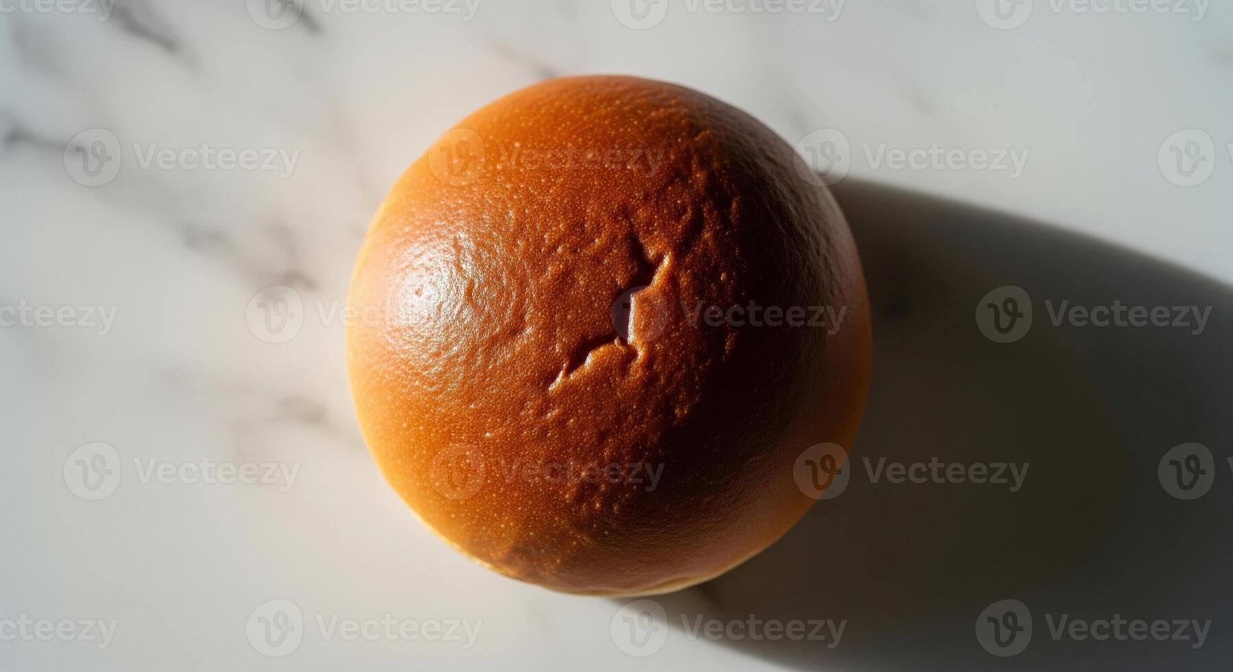 A close up of a bread on a white surface photo