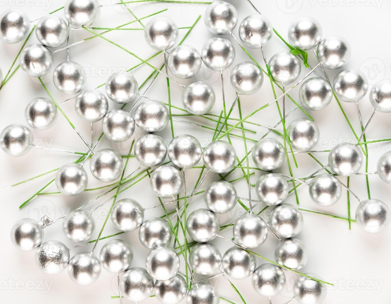 Artificial berry on a wire for needlework and decoration of gifts, wreaths on white background photo