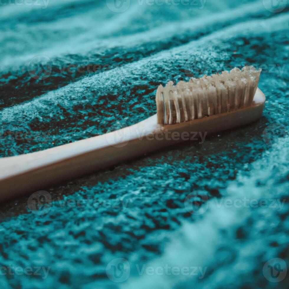 A toothbrush laying on a towel photo