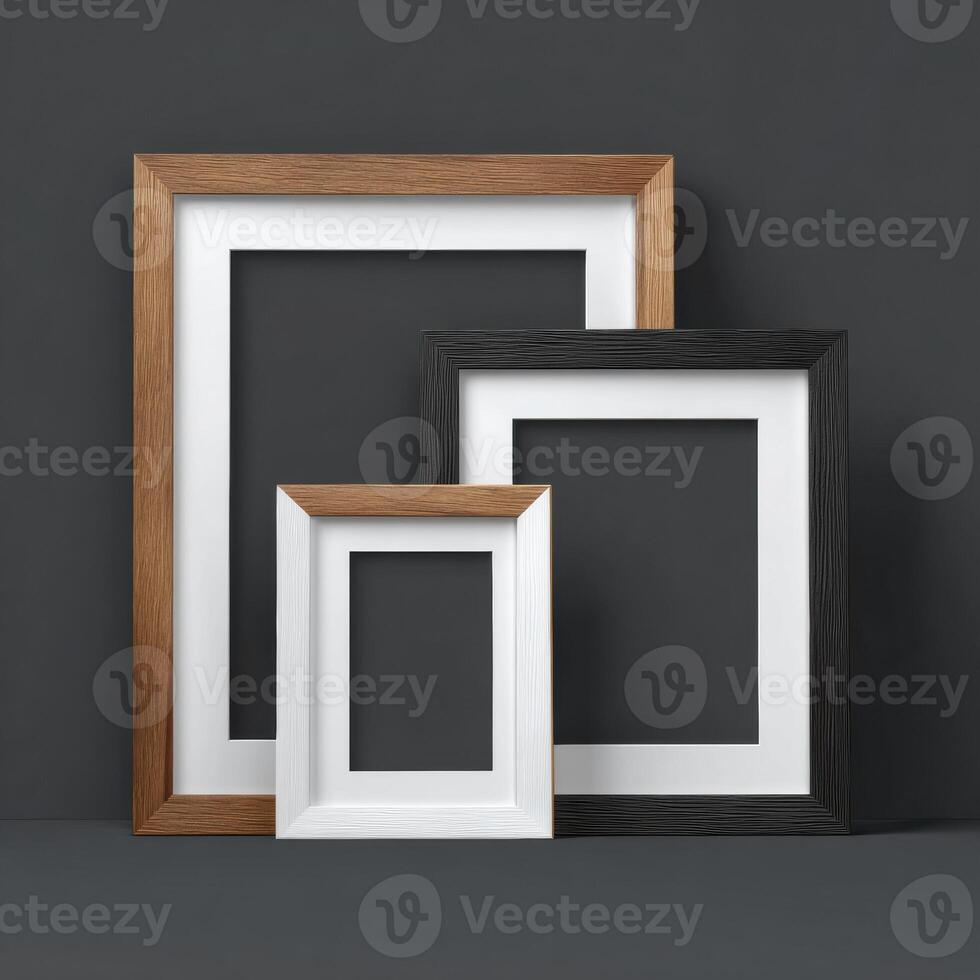 Three empty frames on a gray background photo