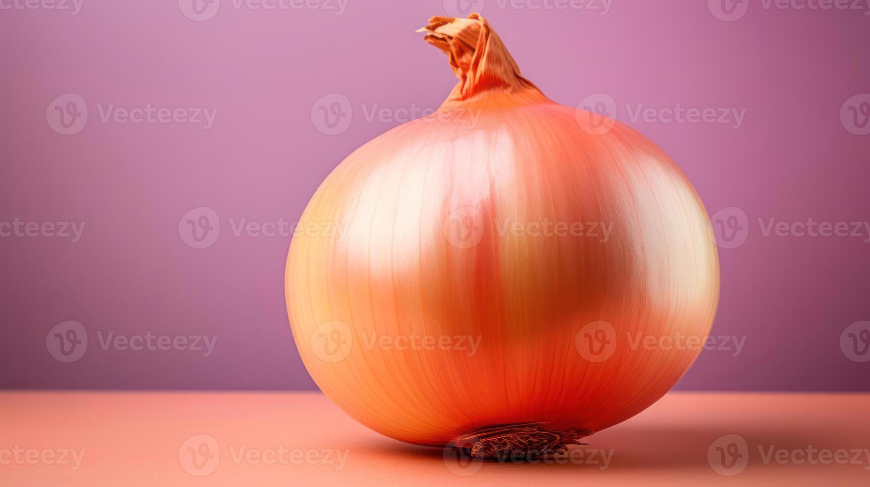 A single, ripe onion against a purple background. photo