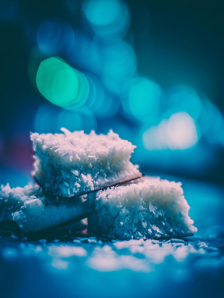 Close up of Delicious Coconut Delights Against a Blue Bokeh Background. photo