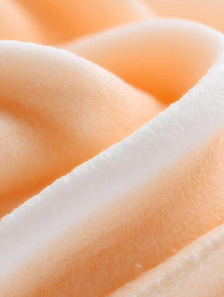 Abstract Close Up of Peach and White Cream Texture, Swirled Design. photo