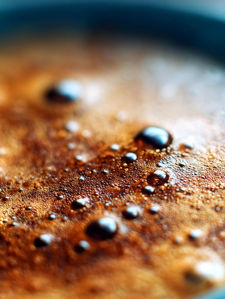 Close Up of Coffee Crema, Rich Texture and Bubbles. photo