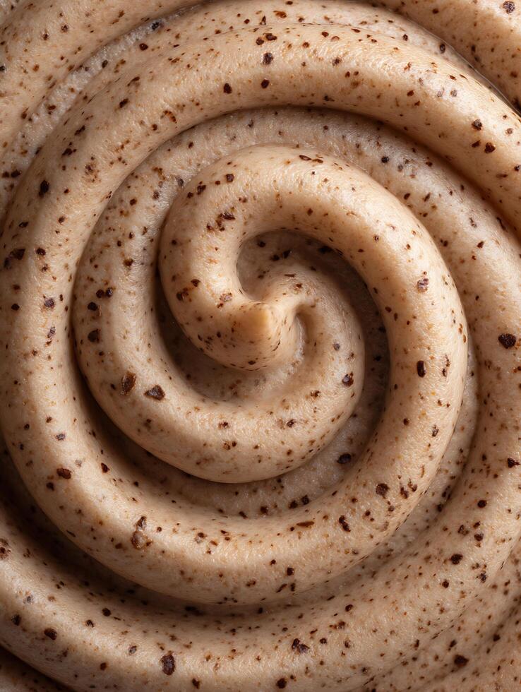 Close up of Swirled Coffee Cream with Chocolate Chips. A Detailed Texture Image Perfect for Food and Beverage Advertising. photo
