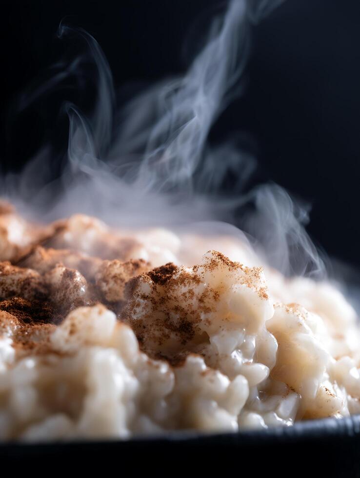 Close up of Steaming Rice Pudding with Cinnamon. A Delicious and Warm Dessert Image. photo