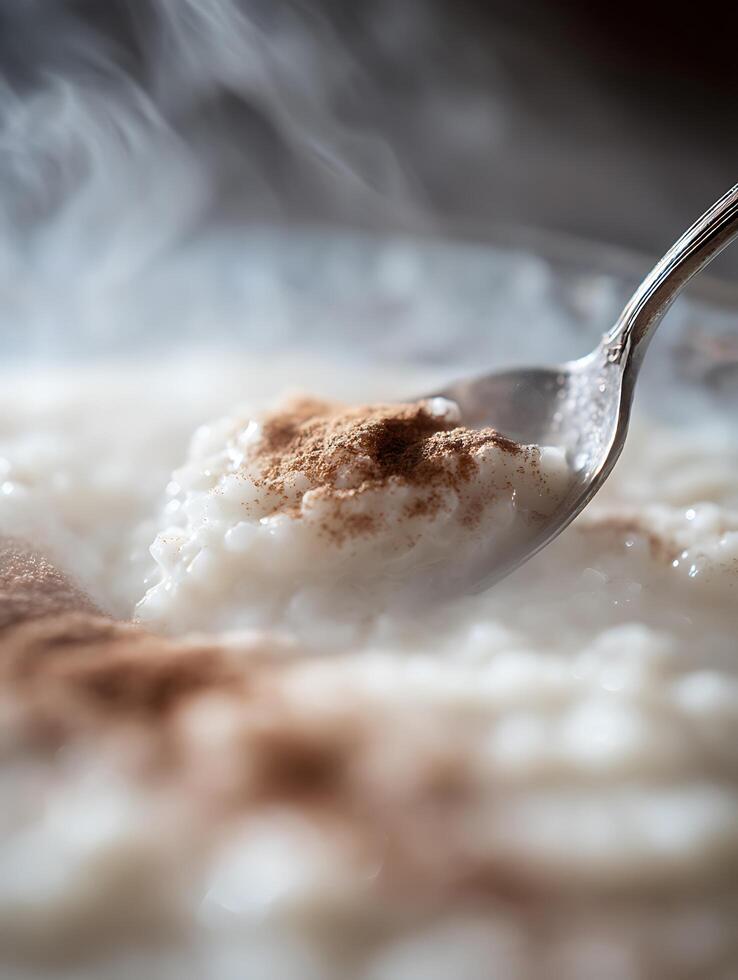 Close Up of Creamy Rice Pudding with Cinnamon. A delicious and warm image perfect for food blogs and culinary websites. photo