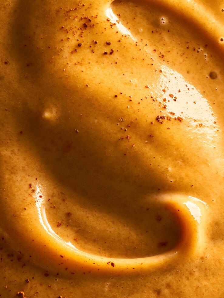 Close Up of Golden Yellow Food Texture with Spice. photo