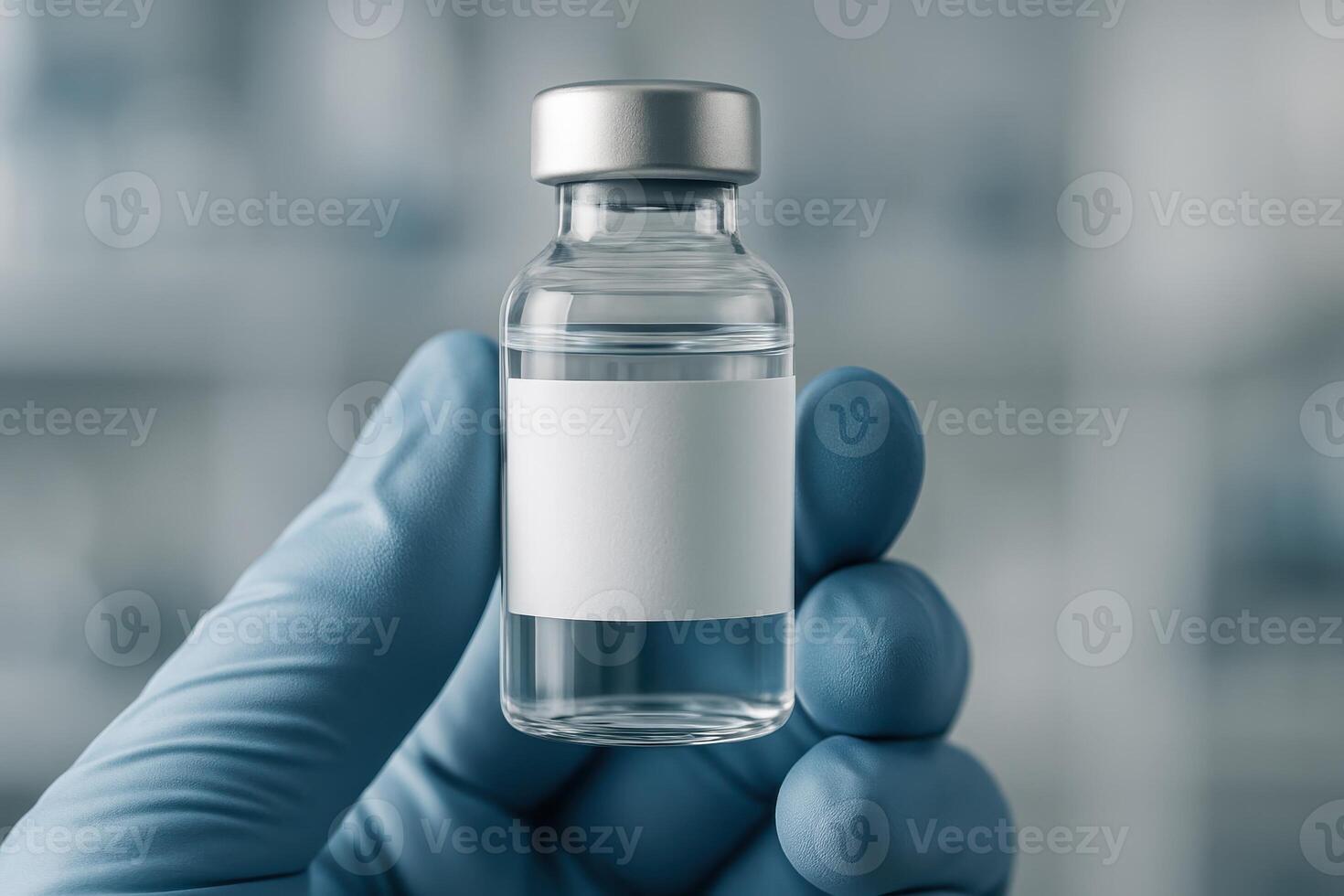 Hand in blue medical glove holding vaccine vial with blank label for research photo
