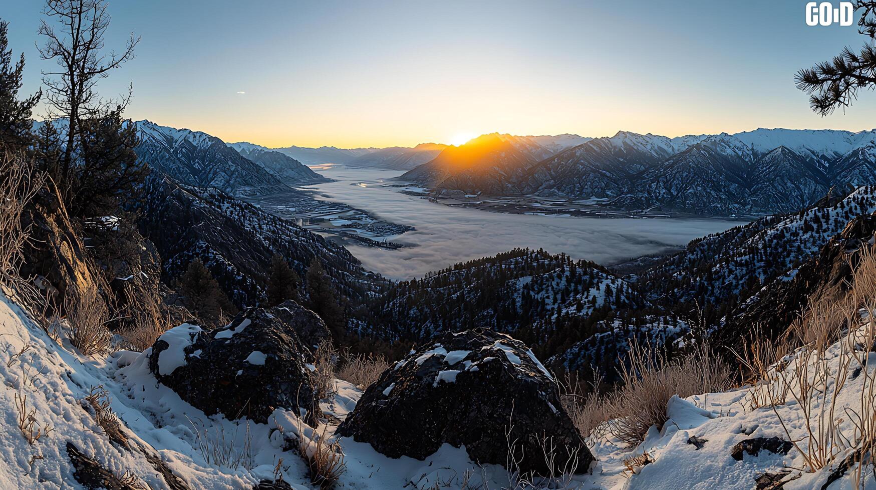 Majestic Sunrise over a Fog-Shrouded Valley in the Snow-Capped Mountains. photo
