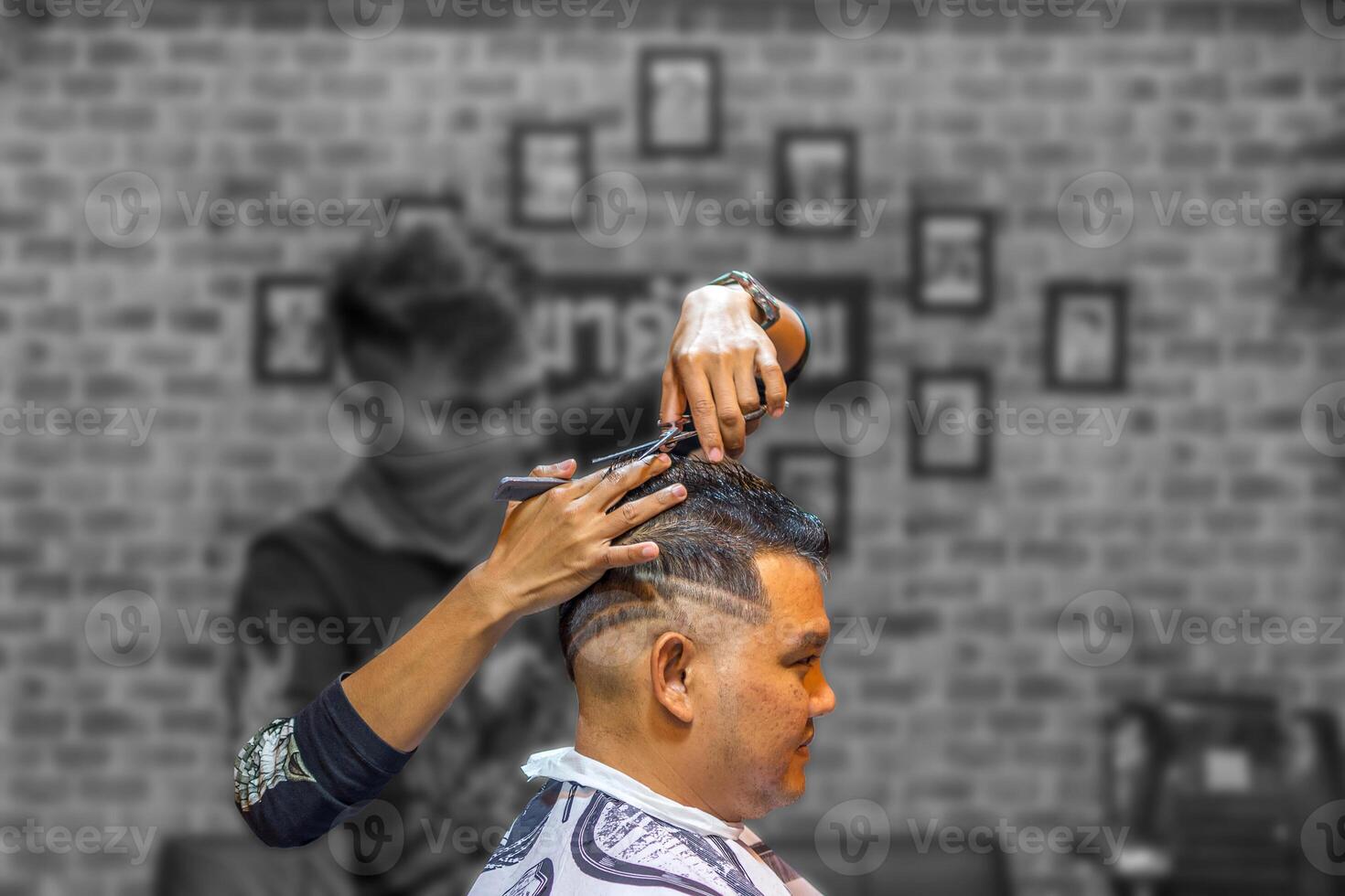A man getting his hair cut photo
