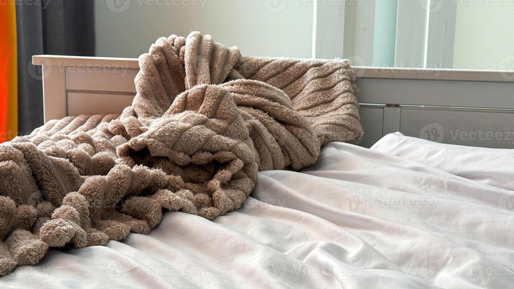 Cozy crumpled blanket whispers autumnal hygge, inviting languid daydreams under Septembers Harvest Moon and National Relaxation Days embrace photo