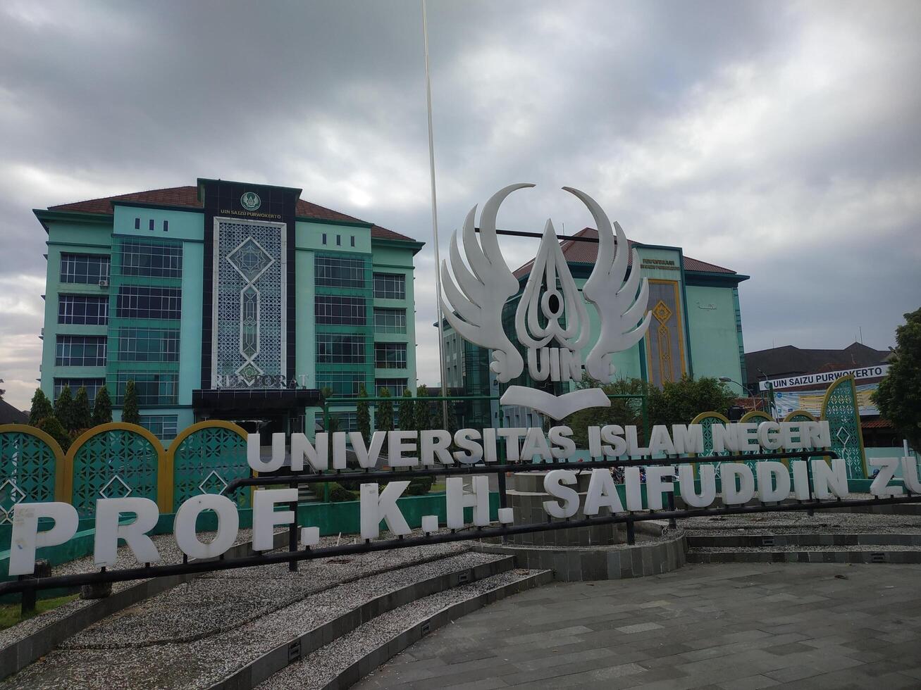 Banyumas, Indonesia, July 15, 2025, Front view of Universitas Islam Negeri Prof. K.H. Saifuddin Zuhri Purwokerto with its iconic logo, modern campus buildings photo