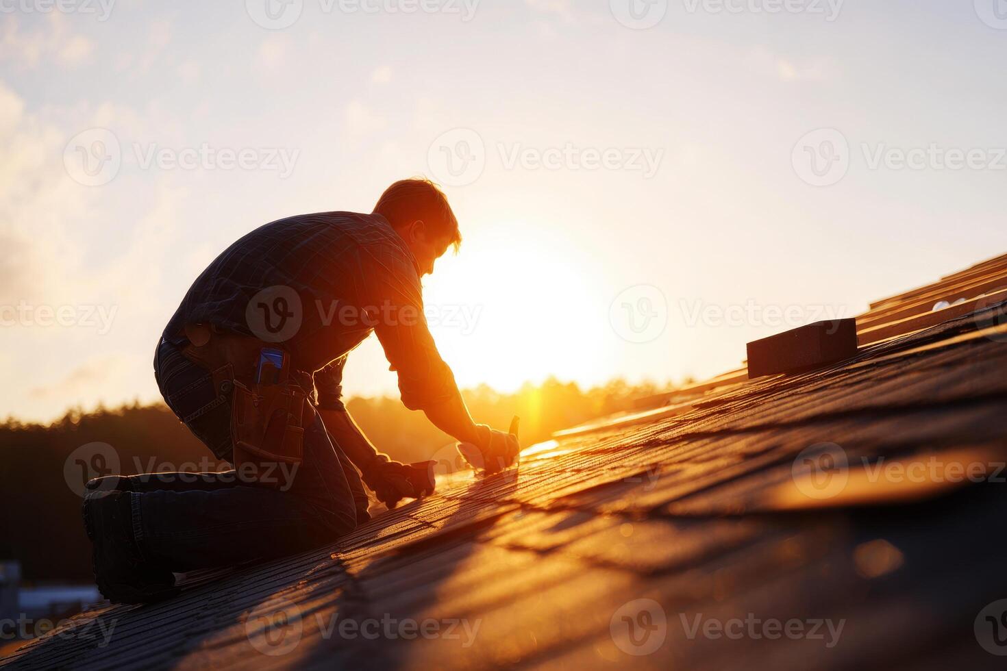 a home repair, focusing on a roofer installing shingles on a roof. photo