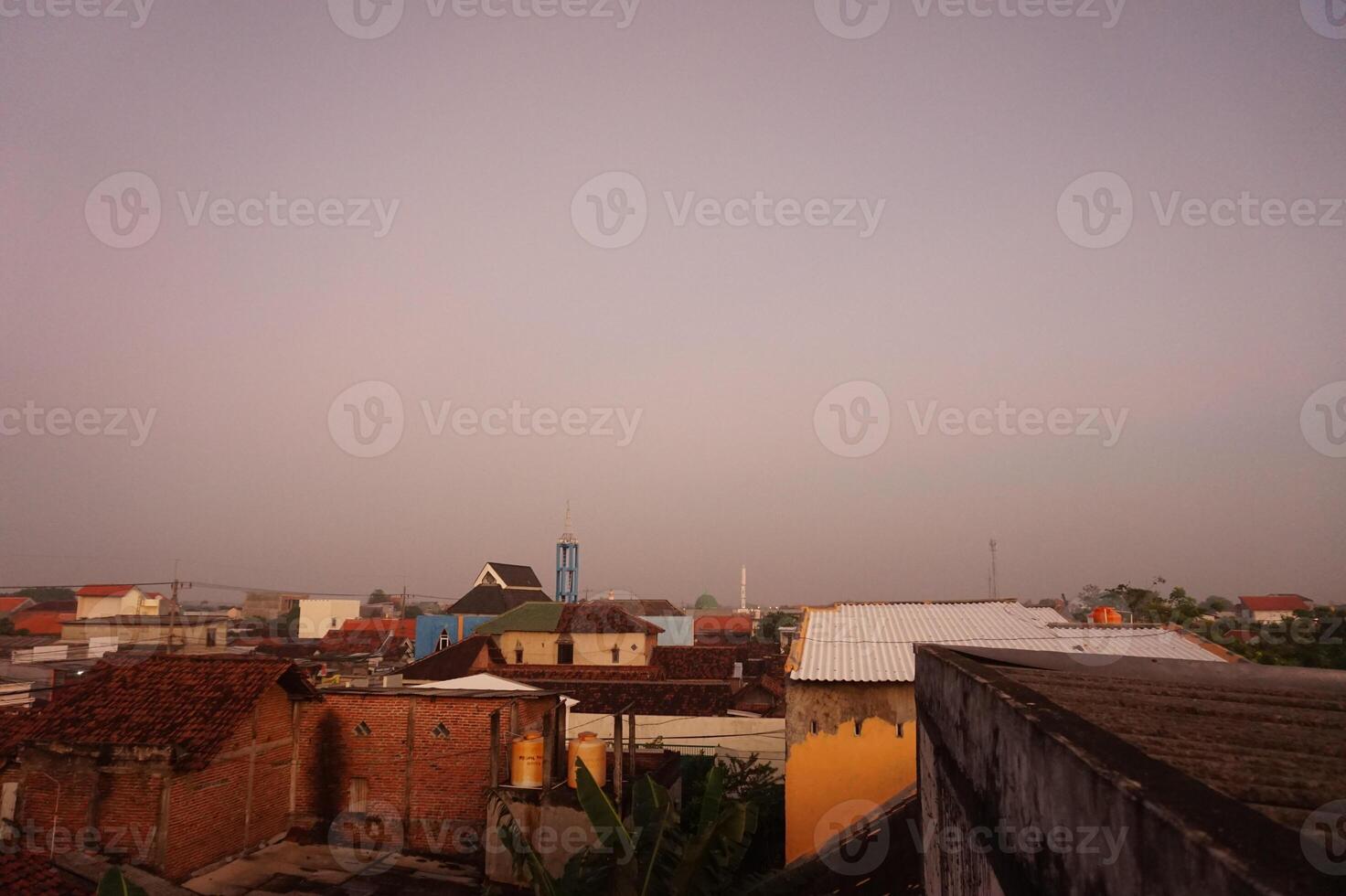 A view of a city from a rooftop photo