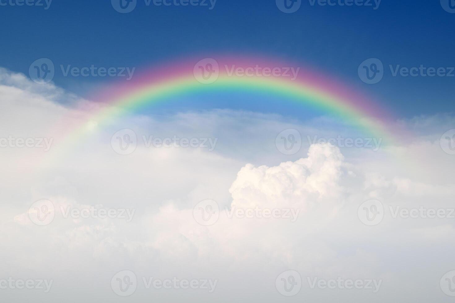 Rainbow in the sky with clouds photo