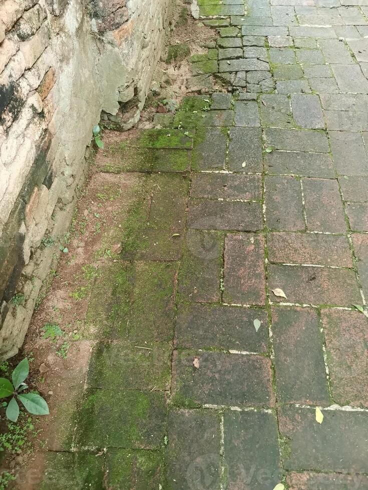 ancient walkway by brick in temple background photo