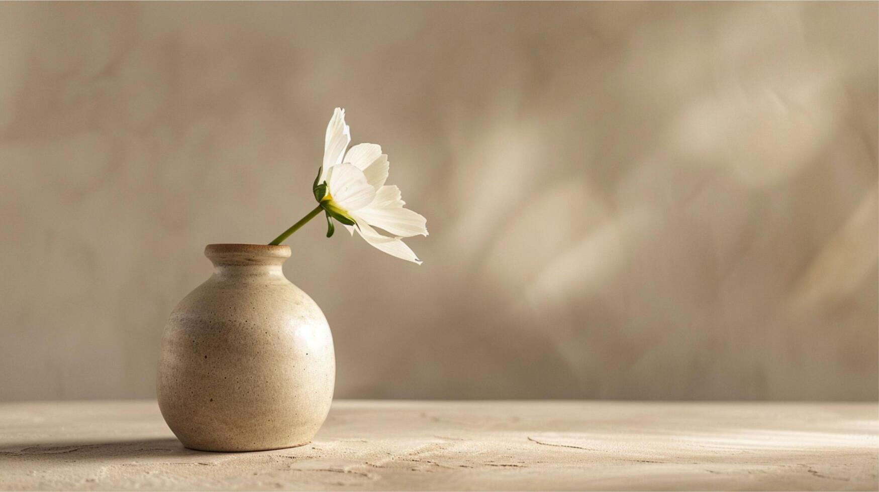 Beautiful spring flowers of white snowdrops in a vase decorate the dining table. It is a natural and delicate floral arrangement. photo