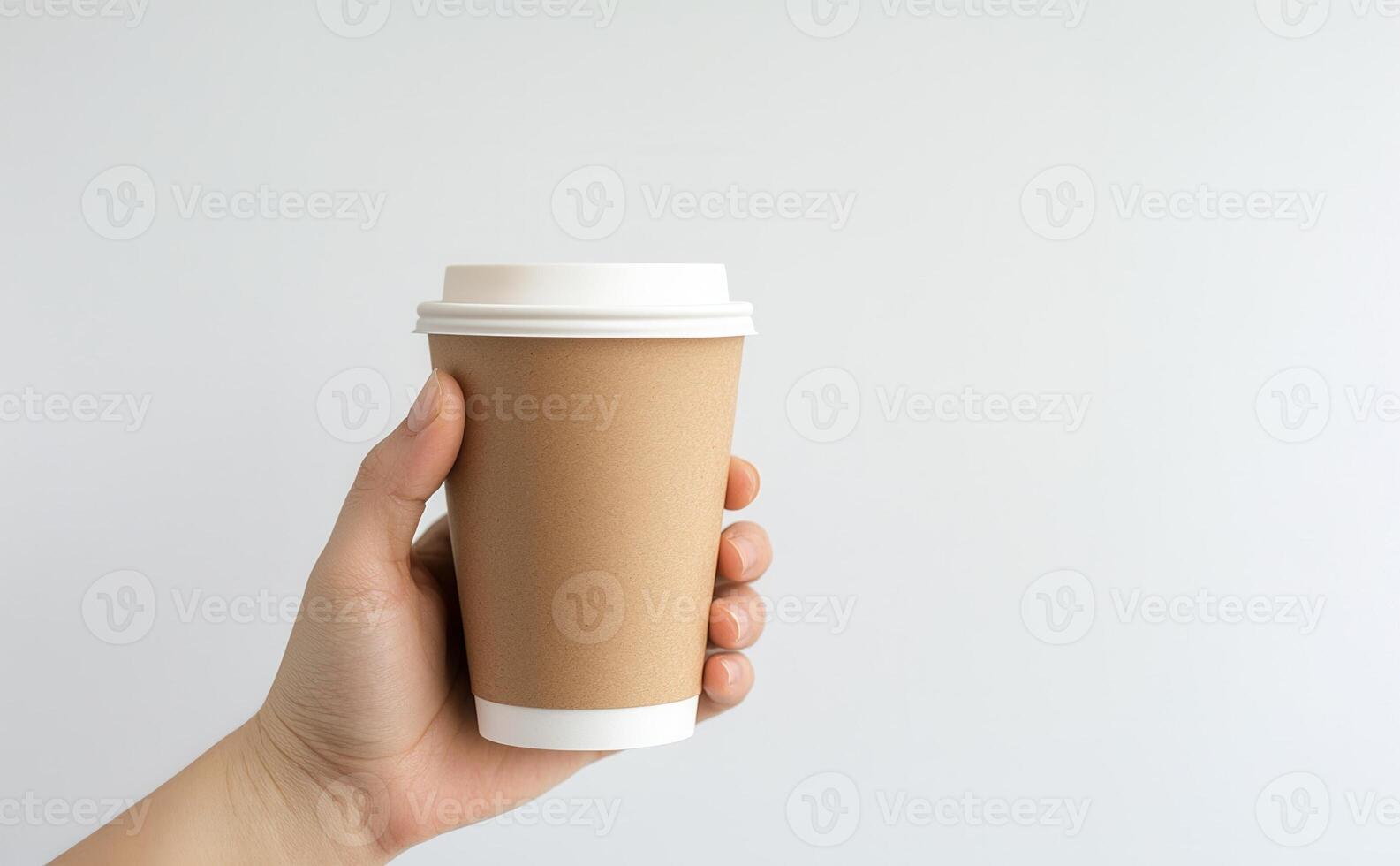 Hand plastic disposable white paper coffee cup with minimalist lid, gripping composition emphasizing simple beverage container design photo