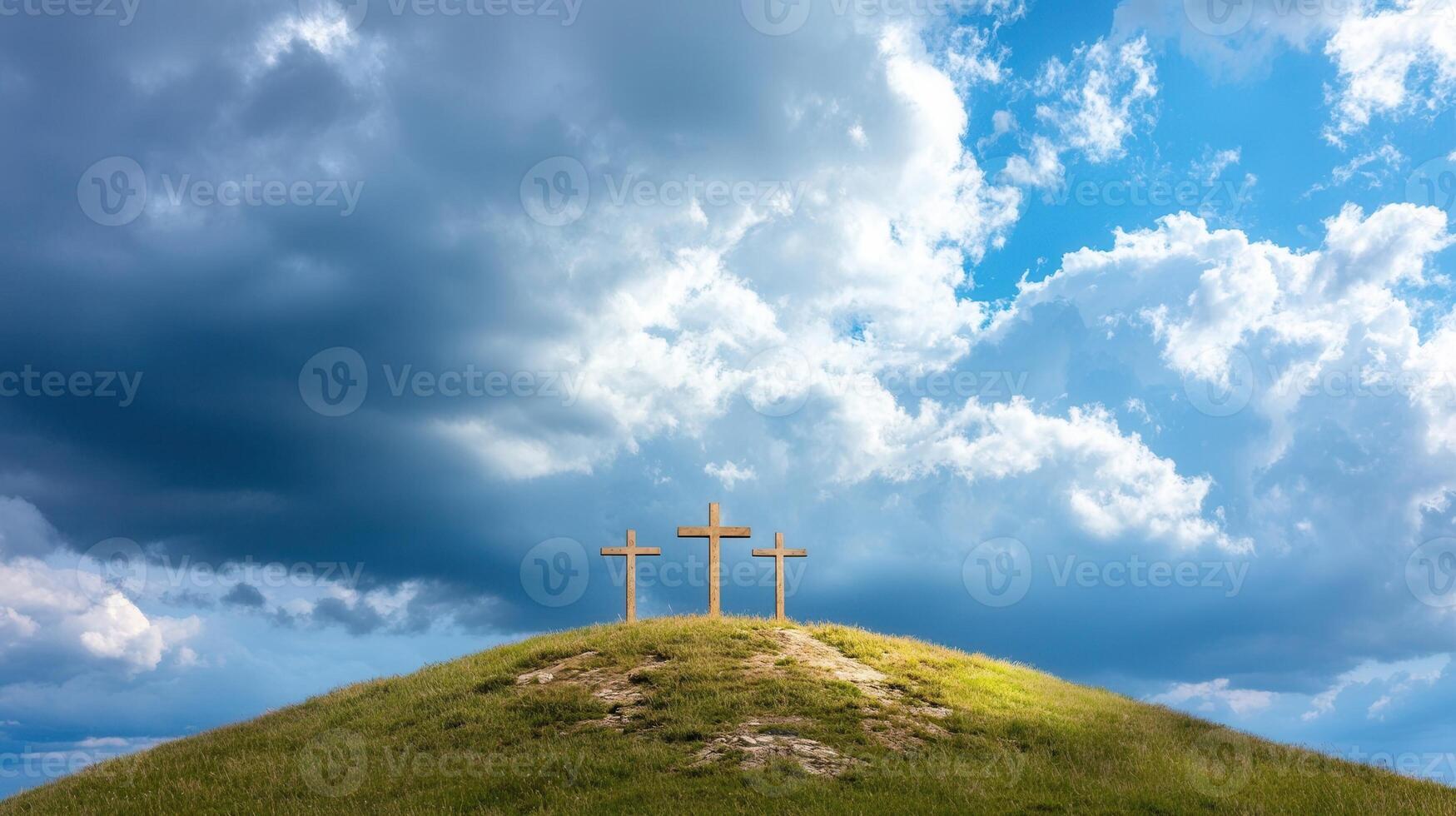 Three wooden crosses stand on a grassy hill symbolizing faith, sacrifice, and redemption against a dramatic cloudy sky photo