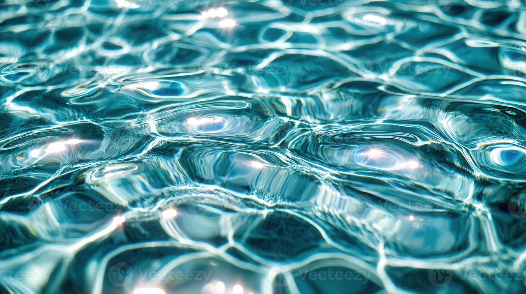 Sunlight creates beautiful reflections on the rippling surface of a swimming pool, ideal for summer and vacation themes photo