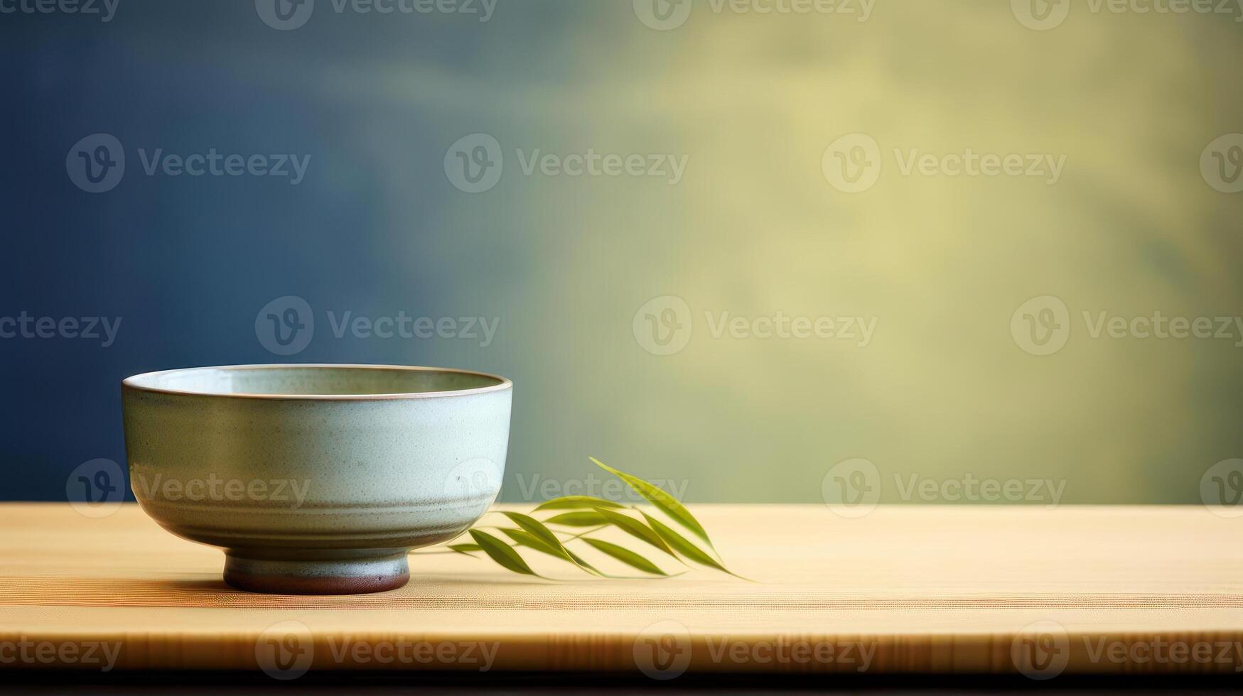 Ceramic cup and bamboo leaves, peaceful tea setting. photo