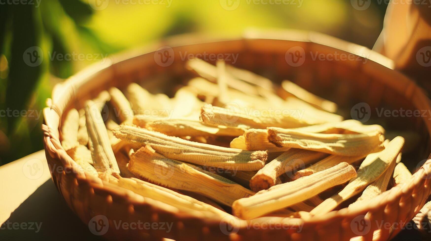 Bamboo shoots in a woven basket, natural light. photo