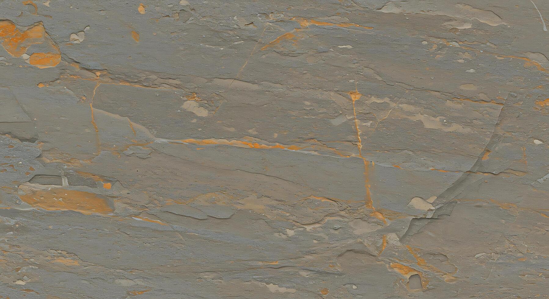 A close up of a stone wall with orange paint photo