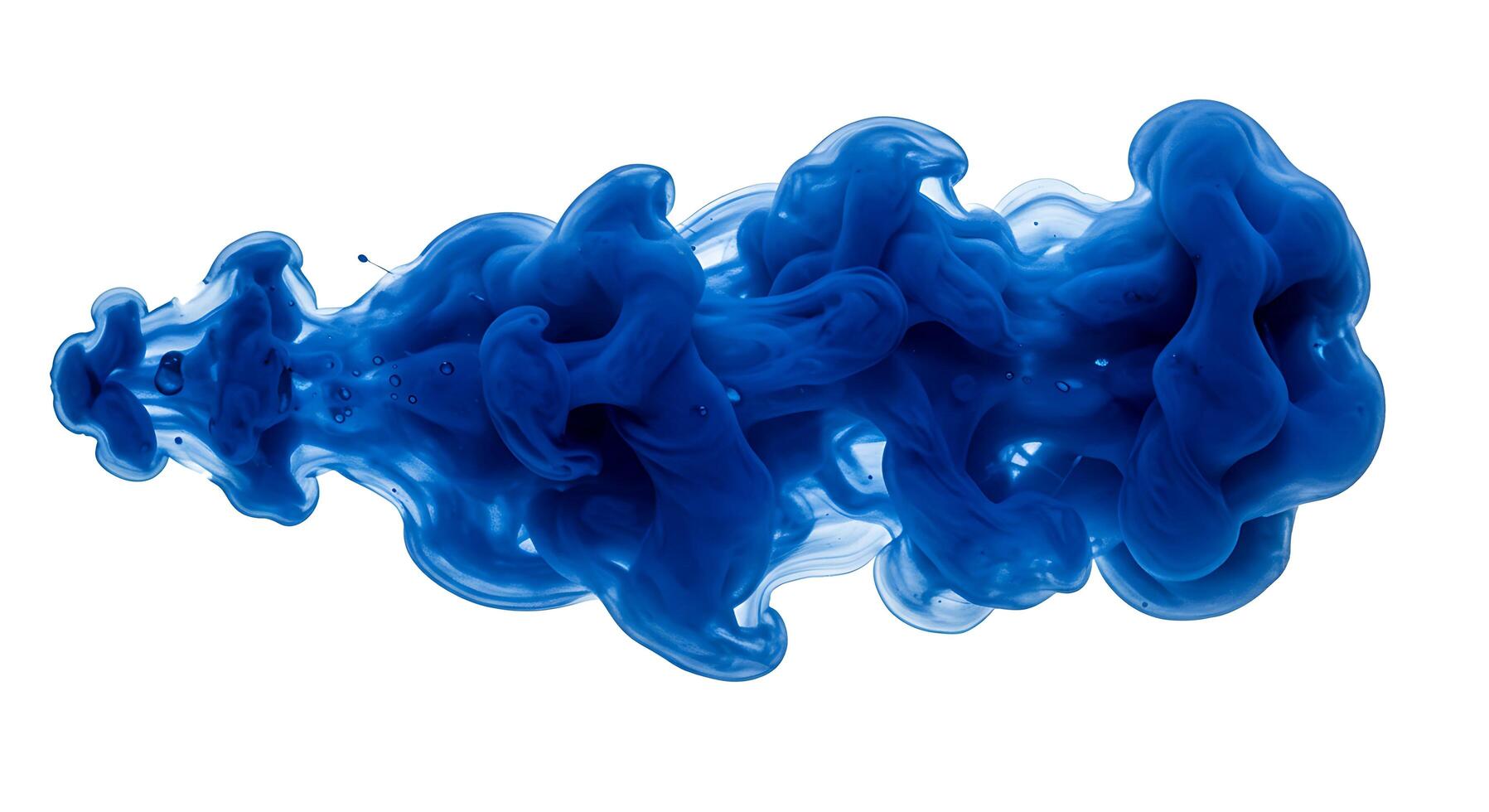 Blue ink in water on white background photo