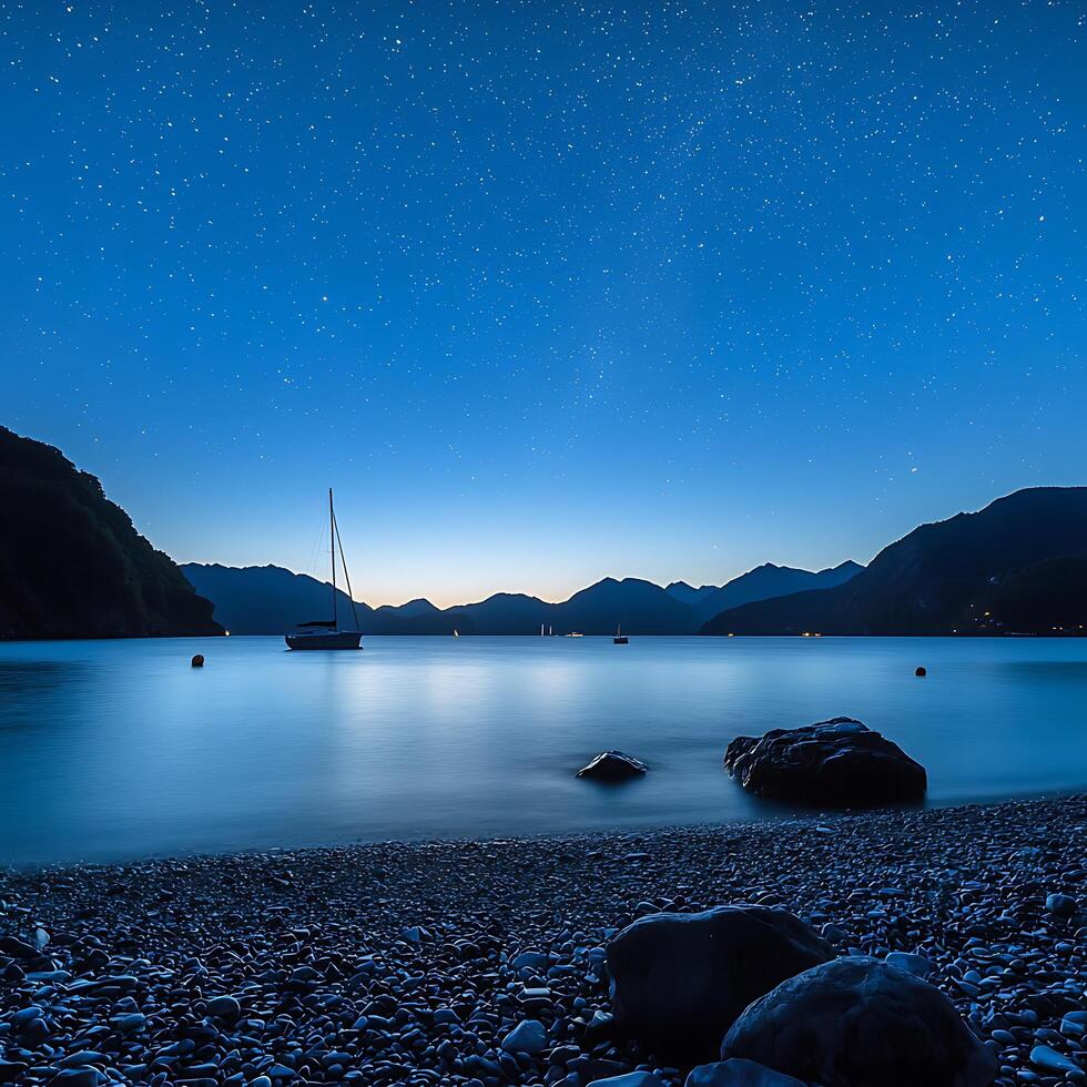 Serene Night Scene Sailboat at Anchor Under a Starry Sky. photo