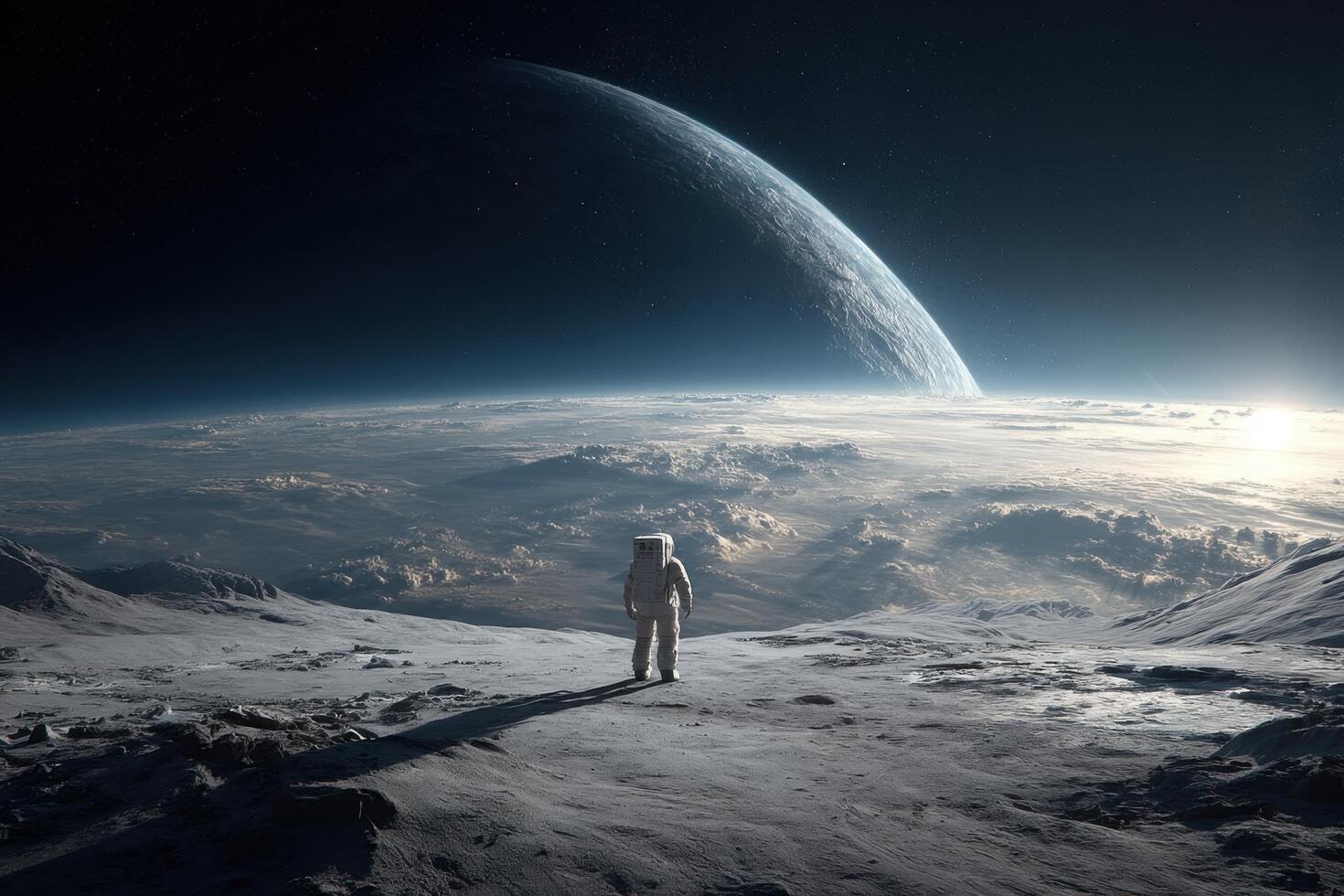 An astronaut standing on the surface of the moon photo