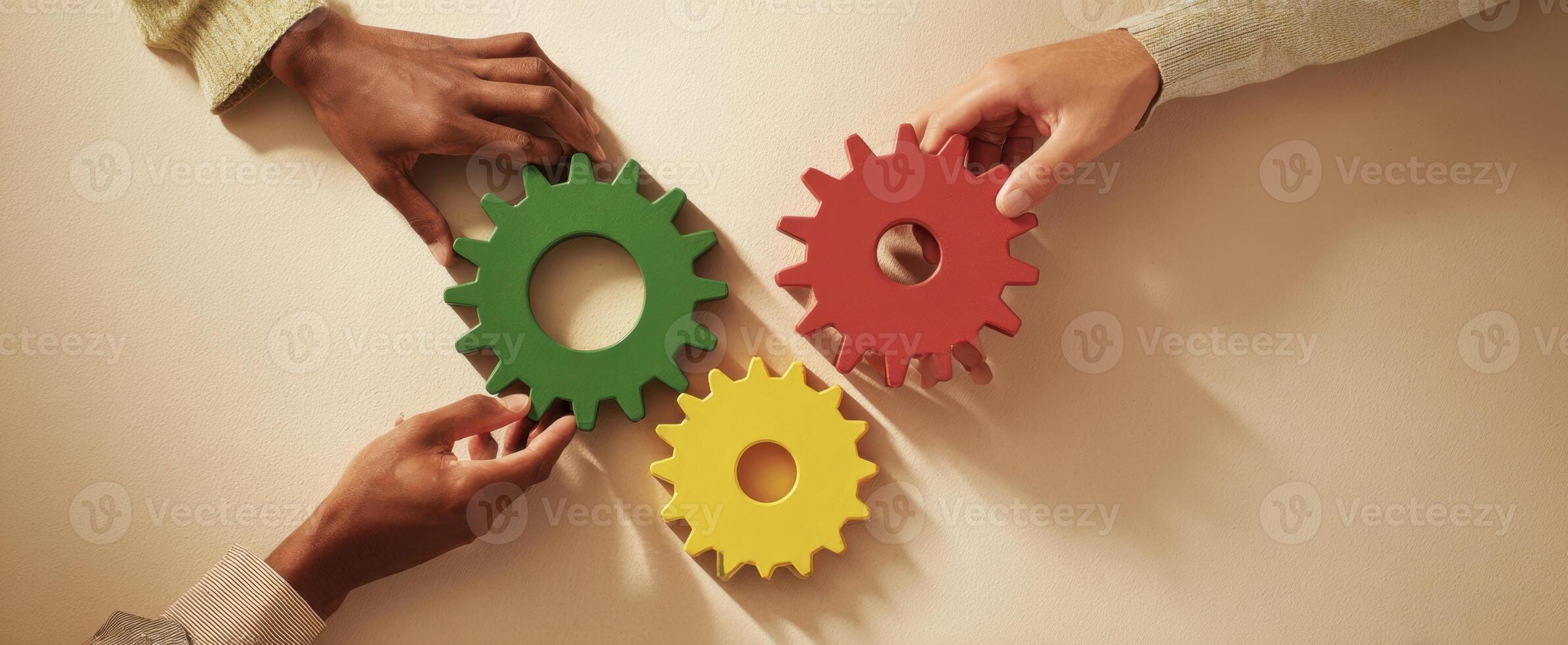 The gears of collaboration symbolize teamwork and innovative problem-solving in business. photo