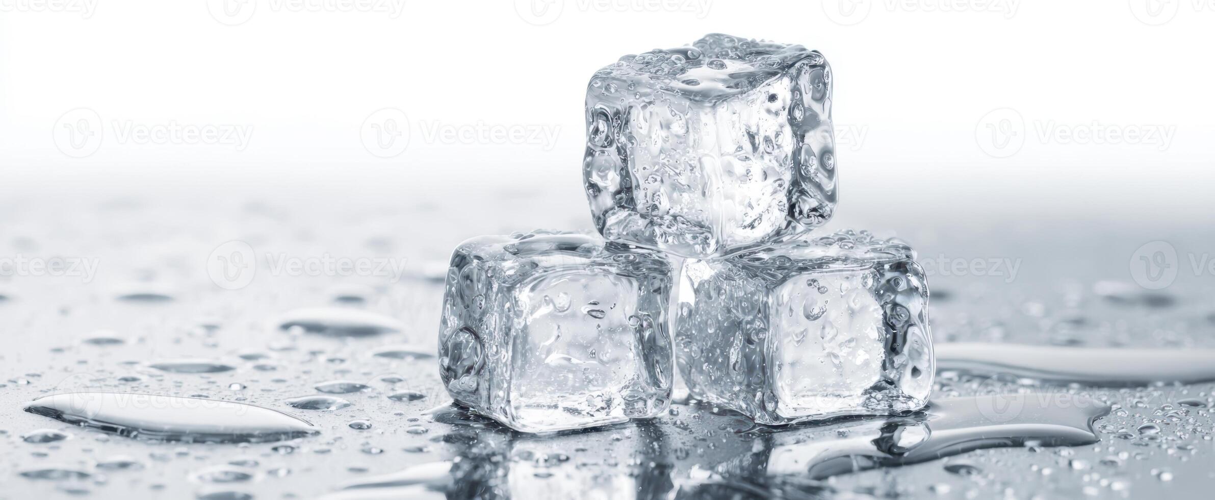 The elegant composition of ice cubes reflecting on a wet surface. photo