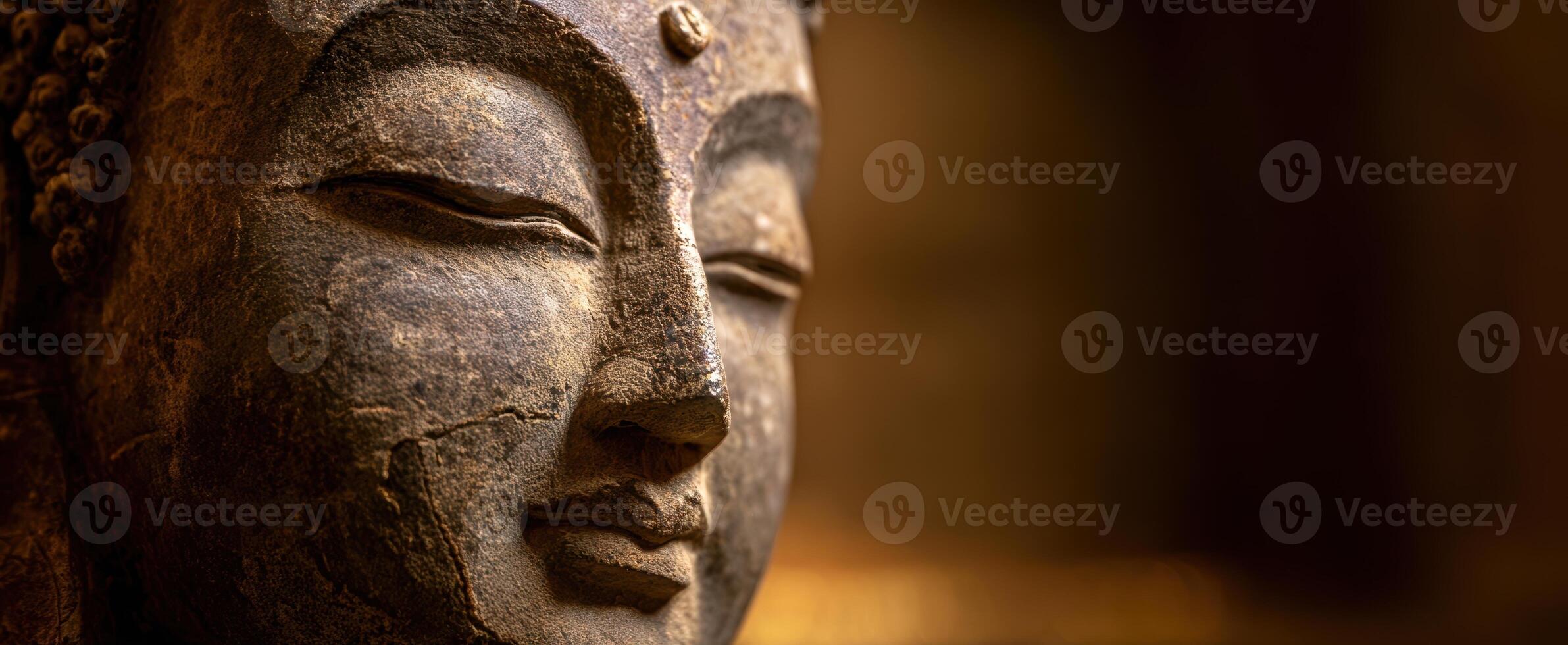 The serene Buddha statue showcasing intricate details and rich historical texture. photo