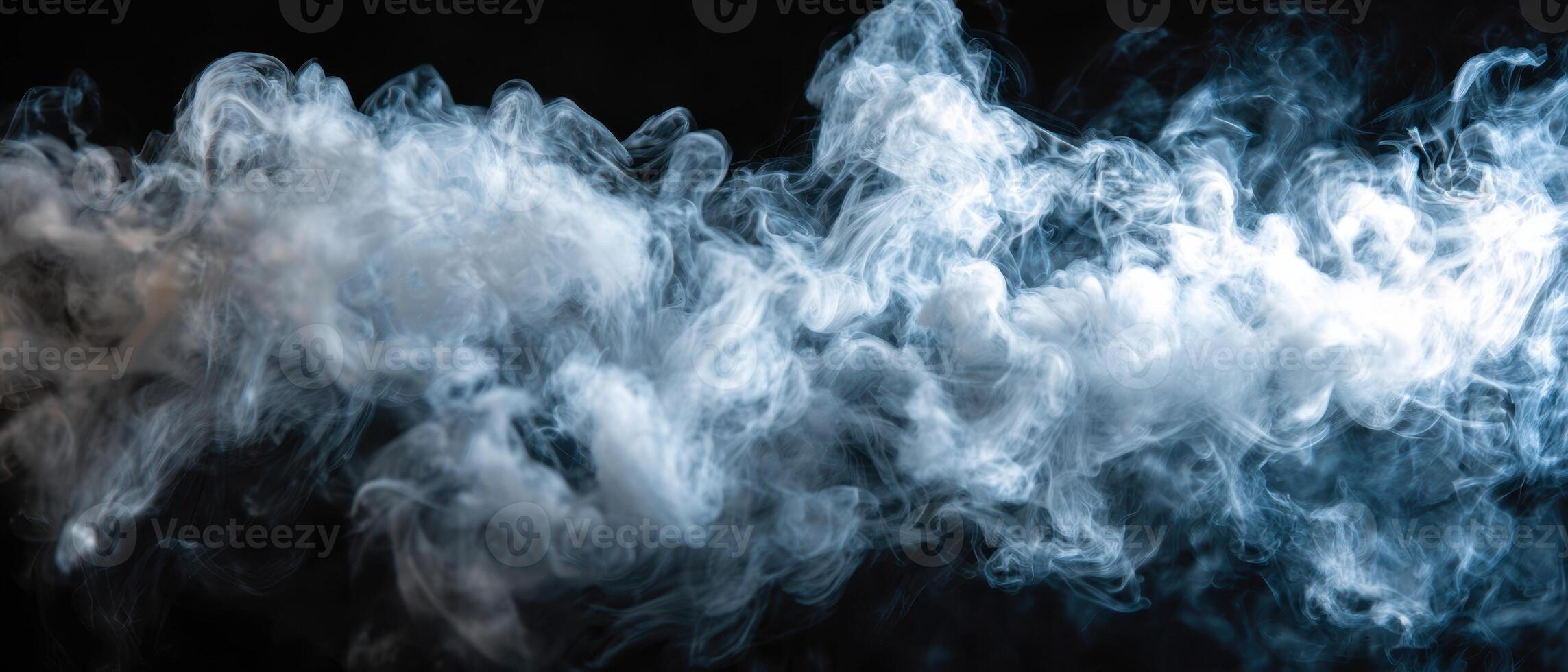 The Ethereal Dance of Smoke Against a Dark Background. photo