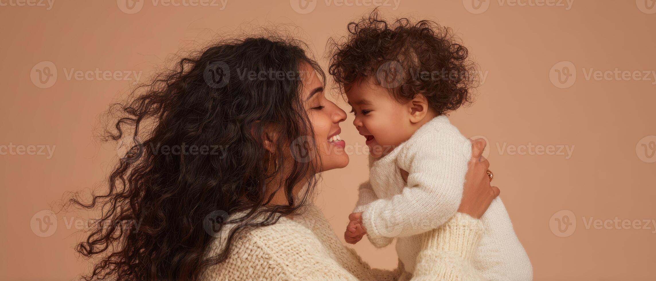 The joyful connection between a mother and her playful child. photo