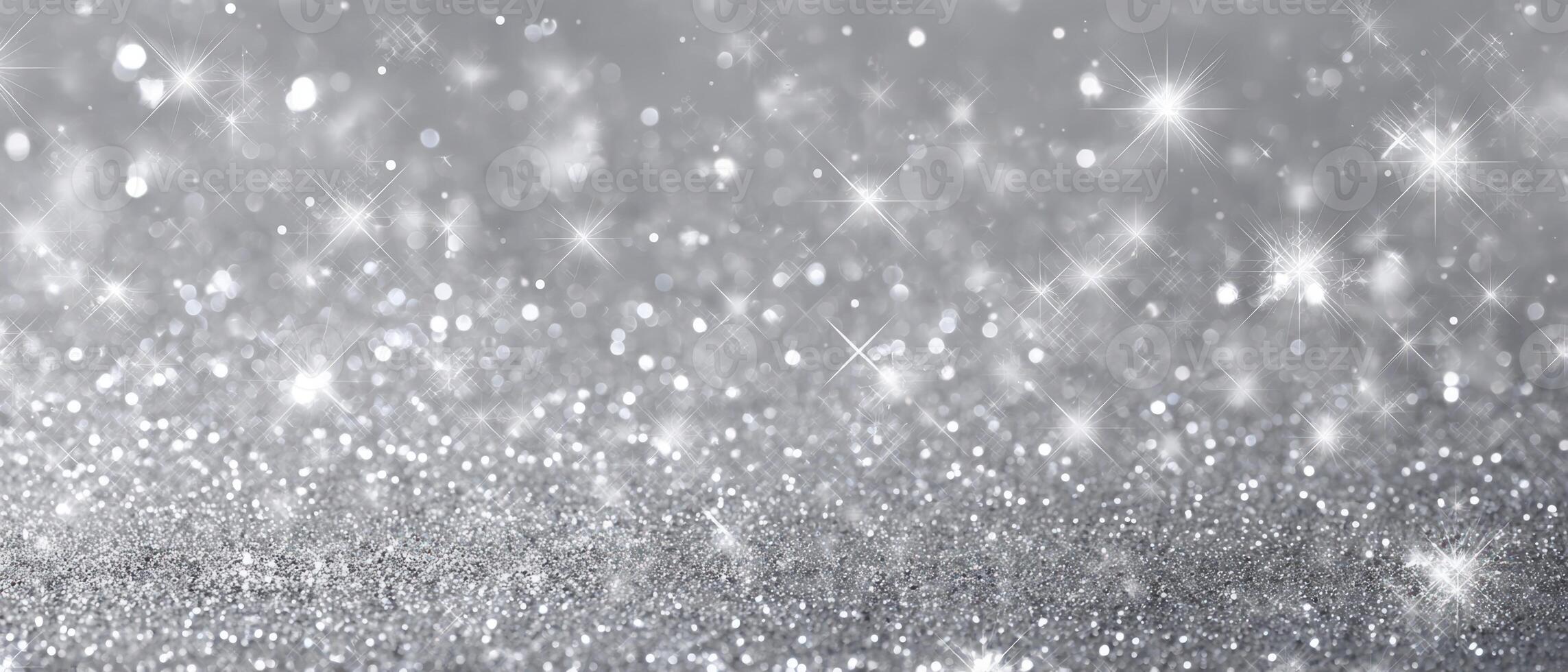 The shimmering silver background filled with sparkling glitter for events. photo