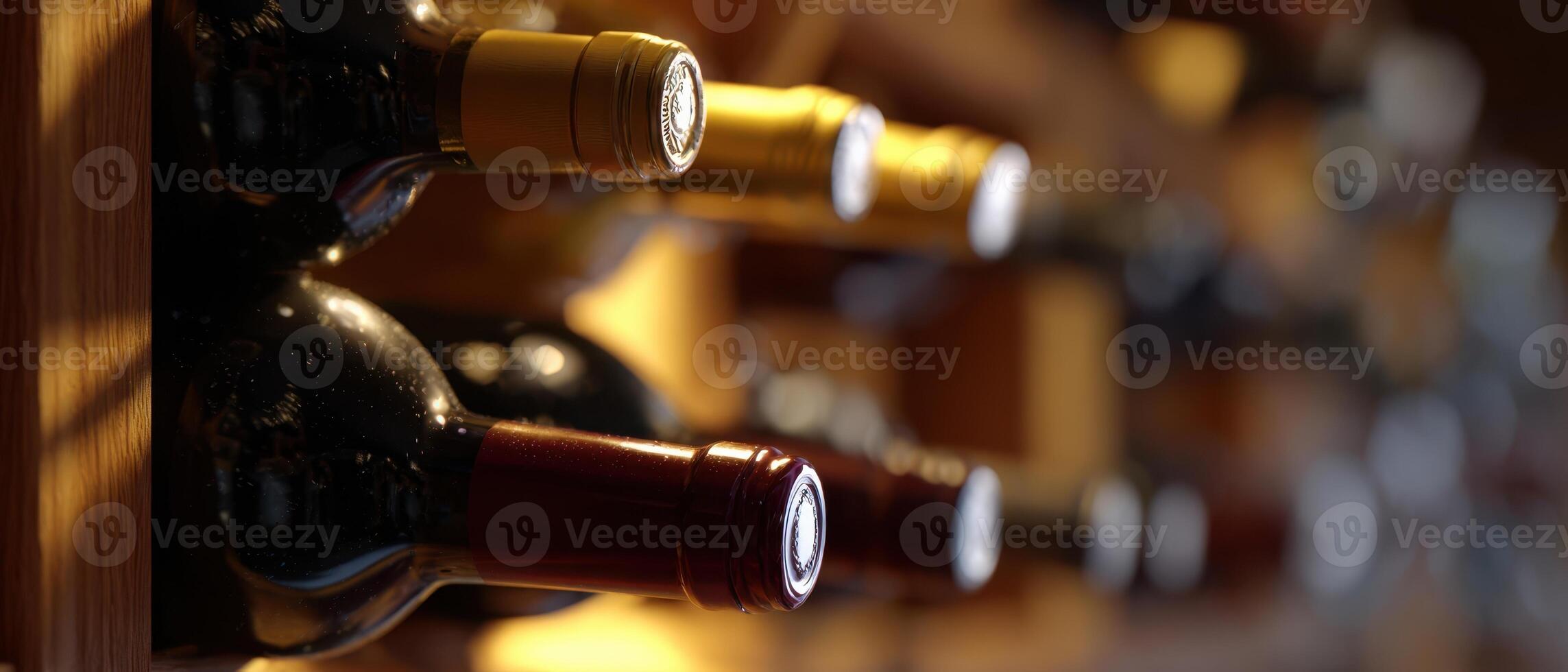 The elegant collection of wine bottles displayed in a sophisticated cellar. photo