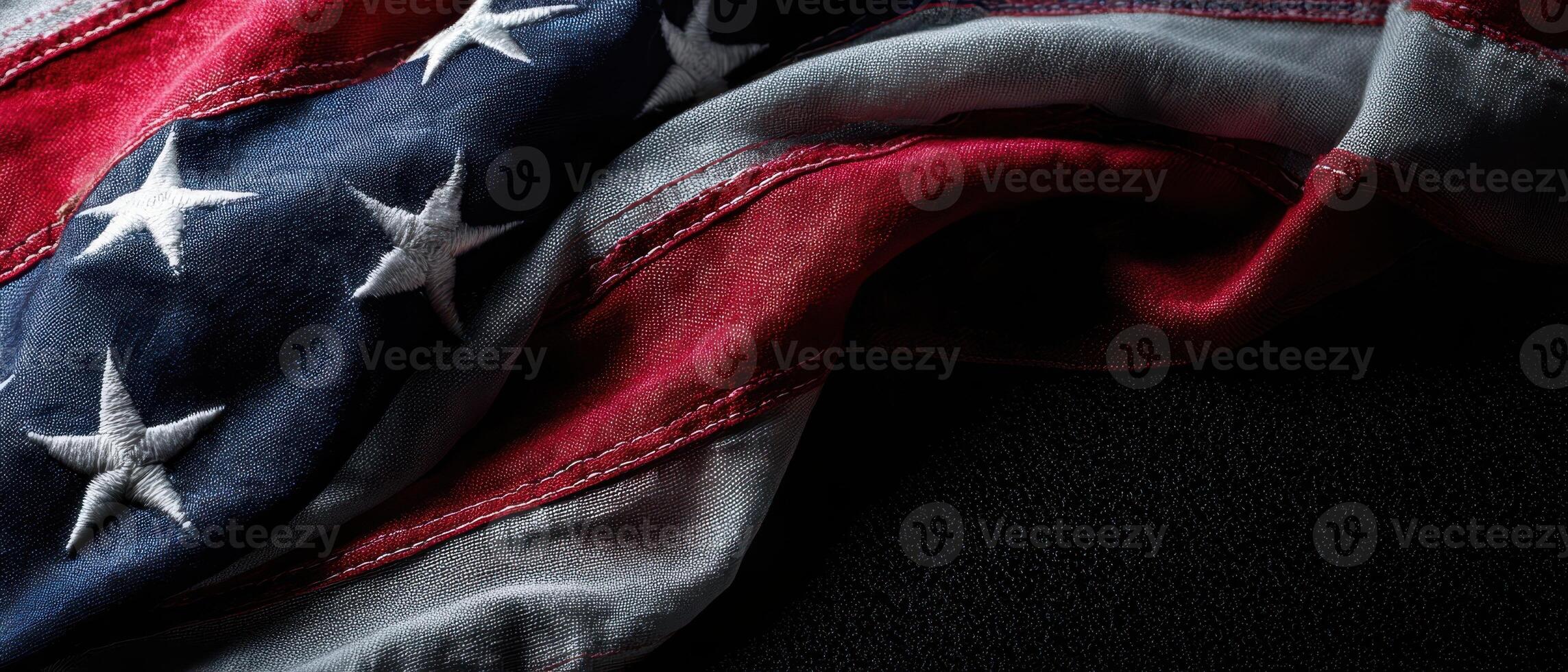 The Waving American Flag Displaying Rich Texture and Deep Colors photo