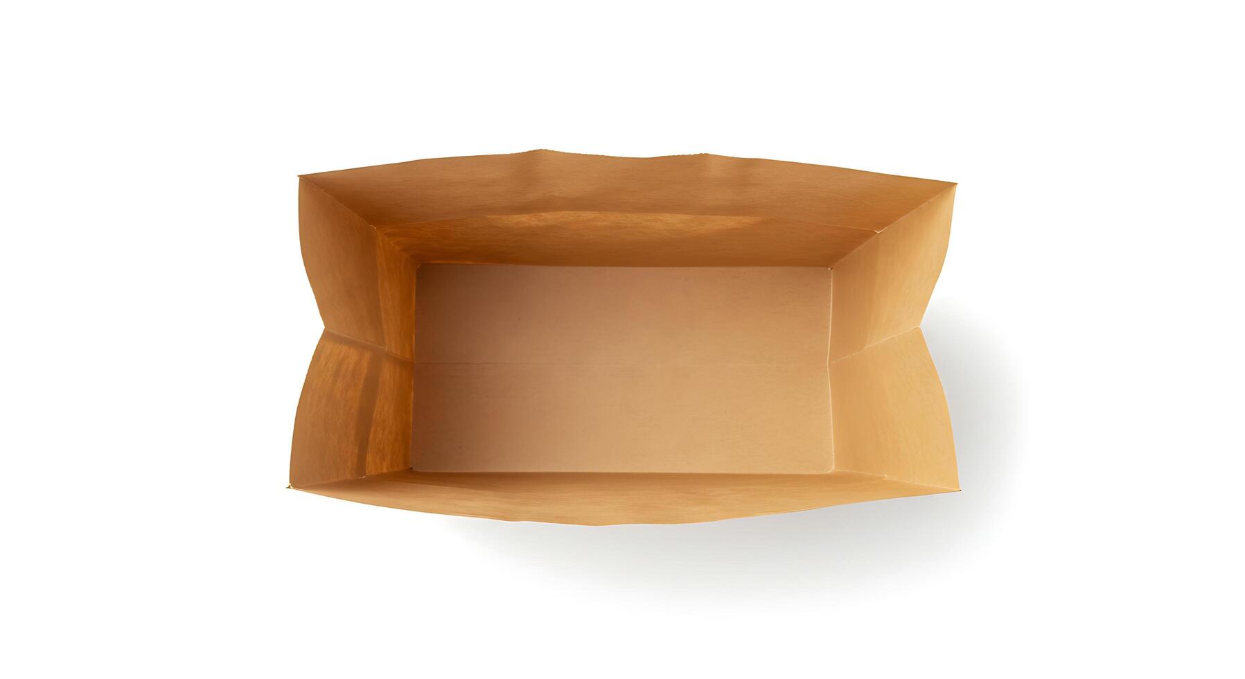 An empty brown paper bag on a white background photo