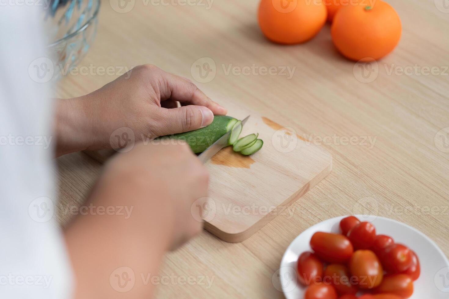Healthy Cooking. Preparing fresh vegetables in a modern kitchen. photo