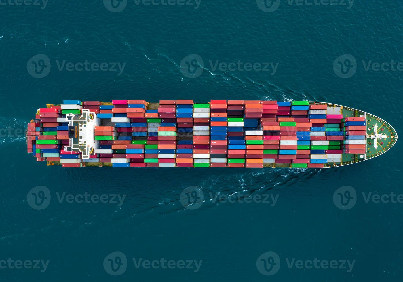 An aerial view of a container ship with many containers photo