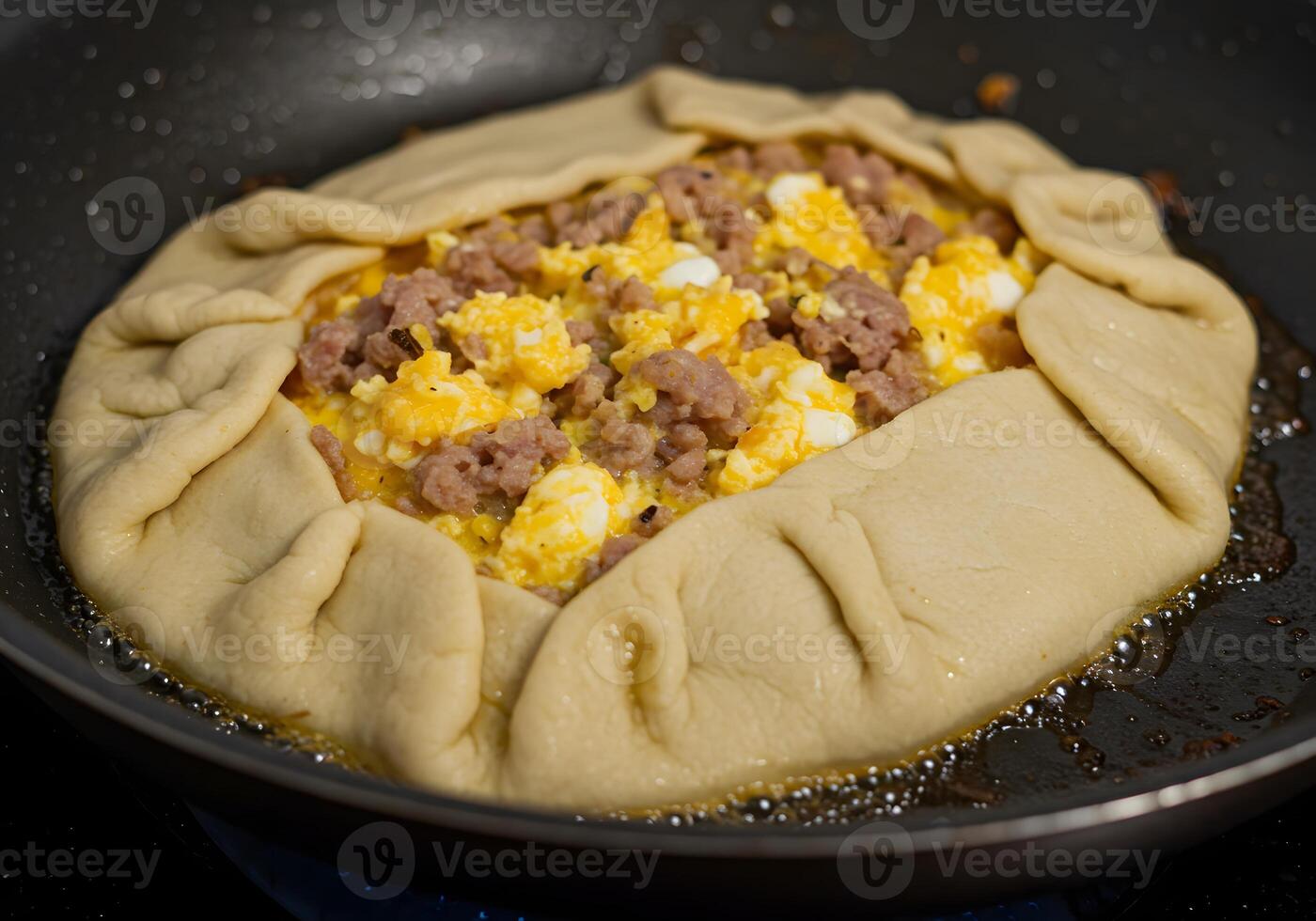 A pan with a doughy substance in it photo
