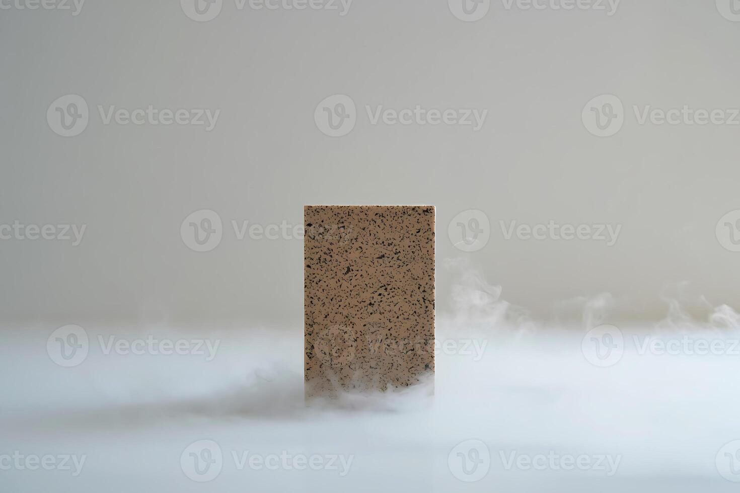 A block of wood with smoke coming out of it photo