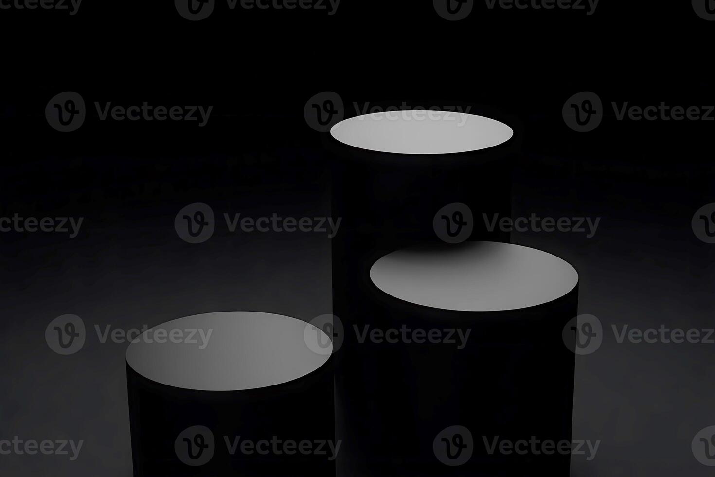 Three black cylinders on a dark background photo