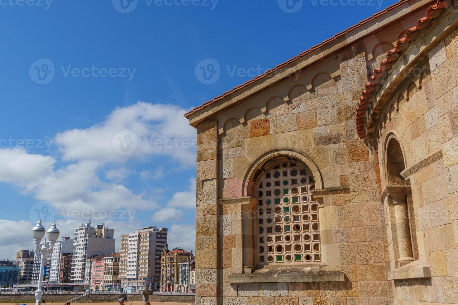 church at the beach of gijon photo