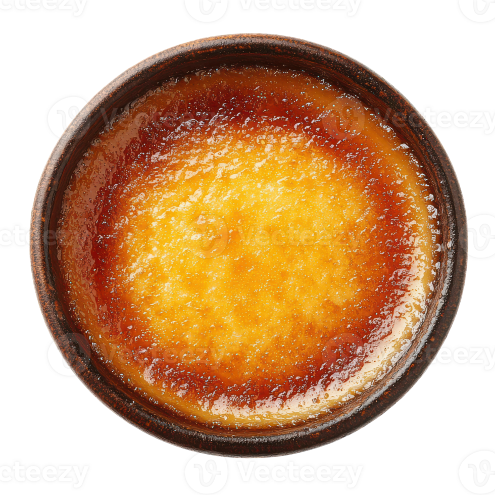 Golden caramel dessert on a rustic plate at a cozy cafe png
