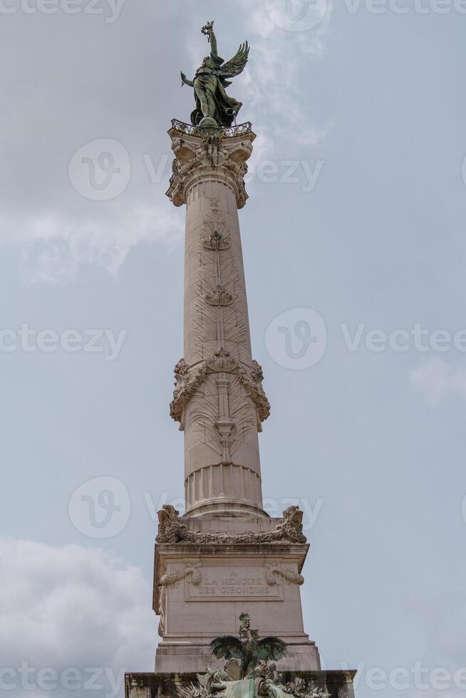 A tall white statue photo