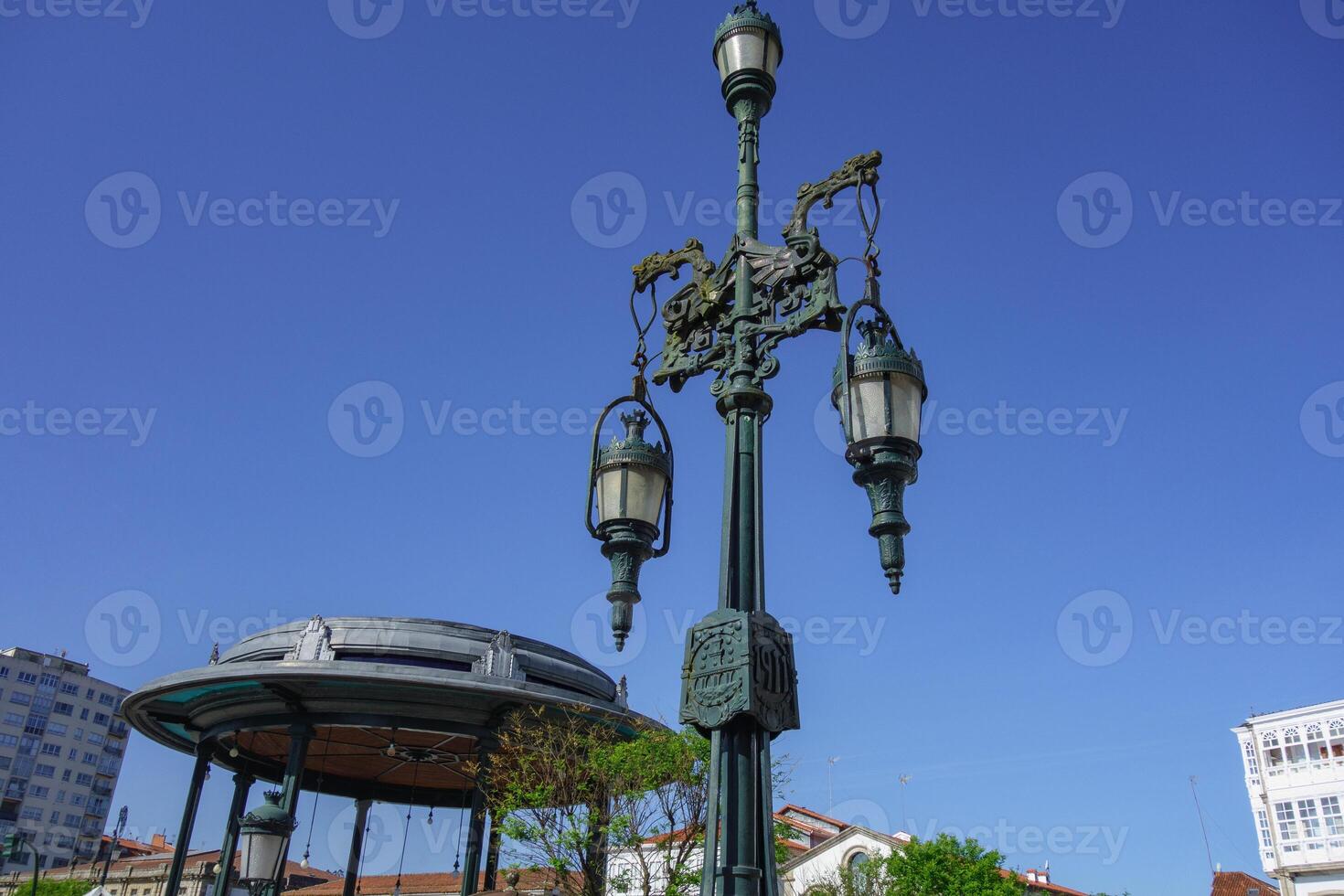 A tall green light post photo