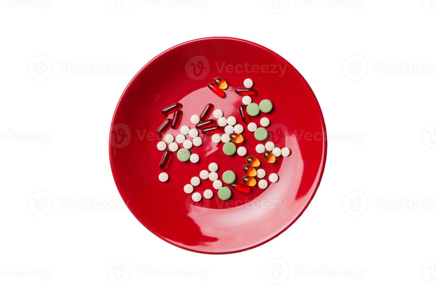 Many different weight loss pills and supplements as food on round plate. Pills served as a healthy meal. Drugs, pharmacy, medical healthycare concept photo